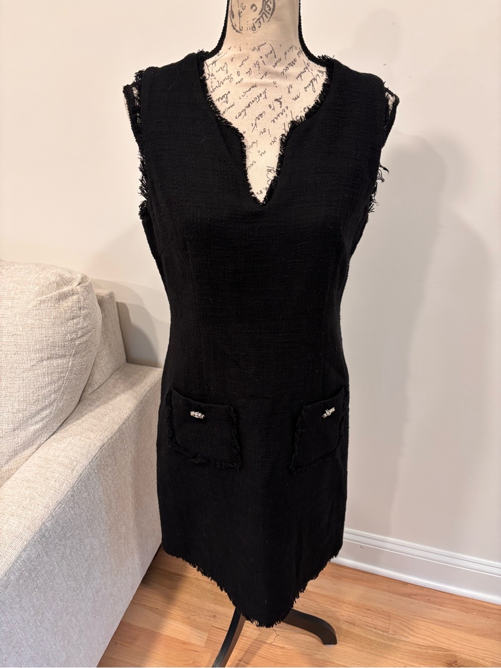 Karl Lagerfeld black sleeveless sheath dress featuring a fringed V-neckline sz 8
